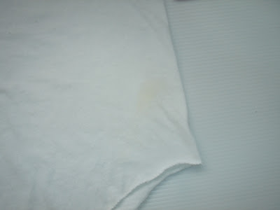 前面裾左付近汚れ