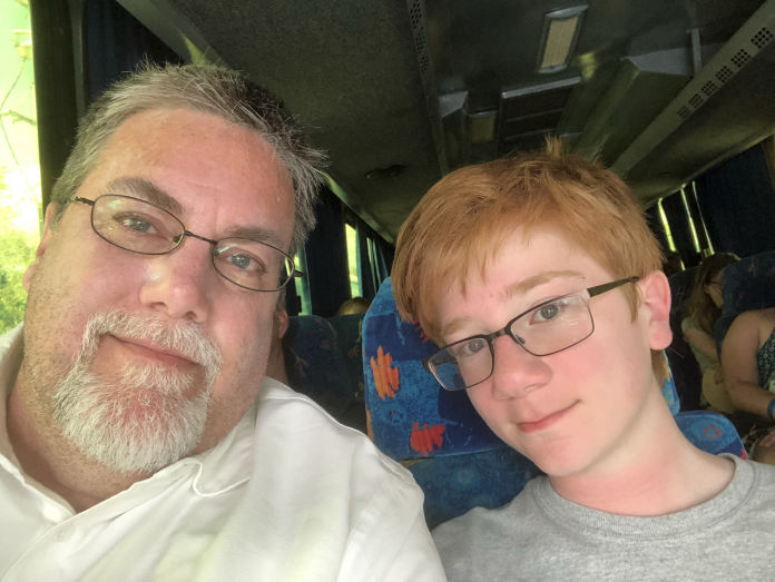 David Brodosi and son in a tour bus in Cozumel Mexico