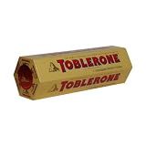 TOBLERONE　トブラローネ　トブレローン ミルクチョコレートバー　6本入り　(600g)   TOBLERONE Swiss Milk Chocolate With Honey and Almond Nougat 6-100g bars