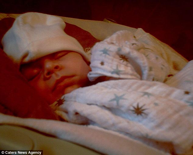 Competition? Cooper's camera captures the latest addition to the family, baby Cameron. The Cross family plan to use a similar neck camera on their new son