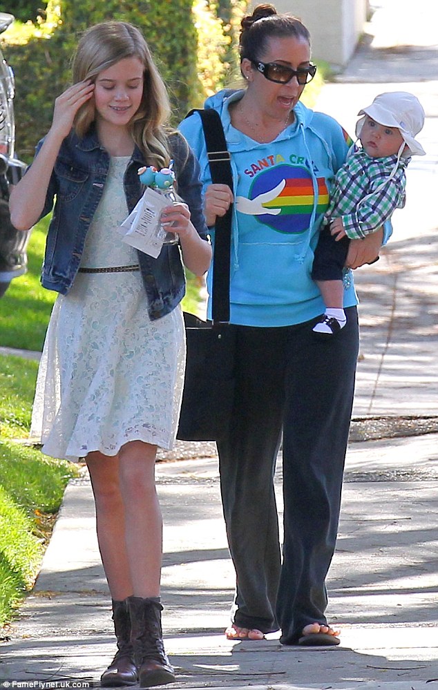No need for a body double: Reese may be able to employ her lookalike daughter Ava as a stand-in for her movies in the future as the pair look so alike