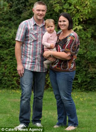 Happy: Denise, a secretary, and Iain, a floor filler, were told their first-born would not make it - and if she did she would be severely brain damaged