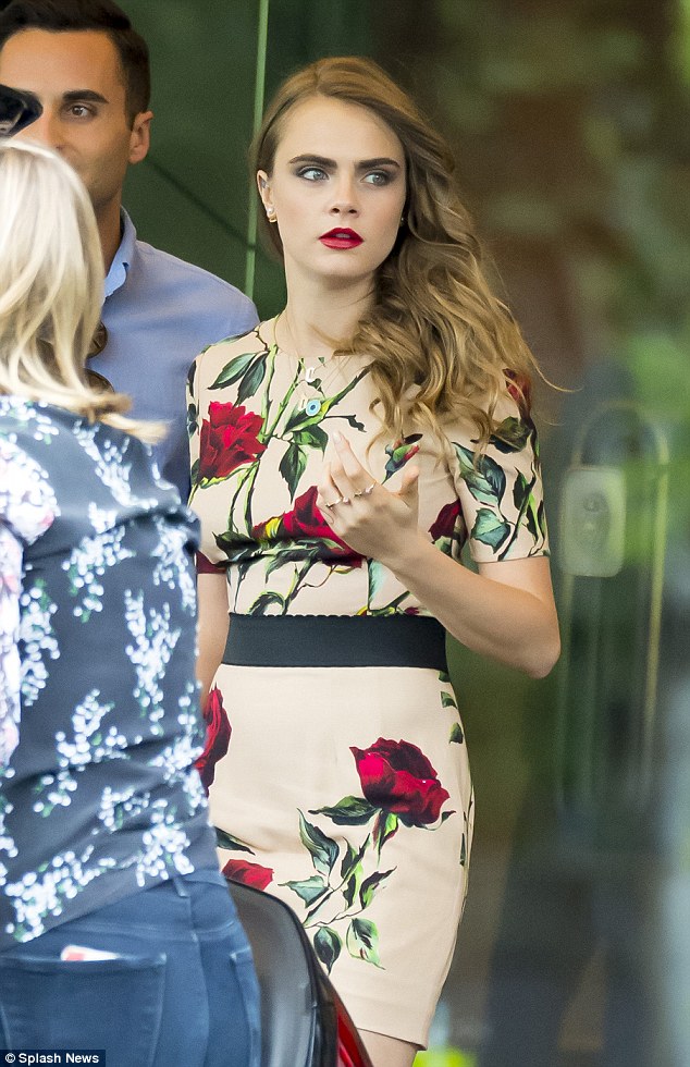Cara Delevingne cut an elegant figure as she left her hotel in Madrid, Spain on Monday 