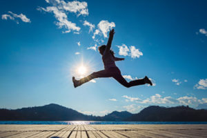 Girl jumping in the sun