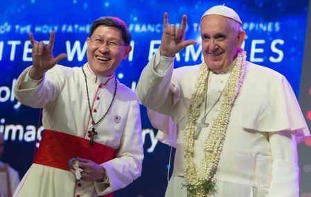 Pope-flashes-hand-signal-in-Philippines-AP