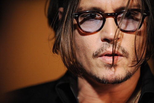 Johnny Depp wearing TART OPTICAL / ARNEL