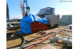 水漏れが見つかった2号機タービン建屋東側の仮設タンク（2月8日撮影）の画像