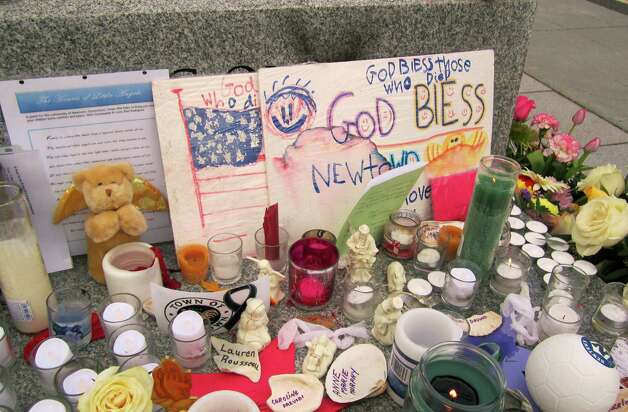 This was part of a large memorial outside Newton’s Edmond Town Hall. The picture was taken Dec. 20, the same day four of the slain schoolchildren killed and two of their teachers had funerals. Photo: Casey McNerthney/Hearst Newspapers / SL