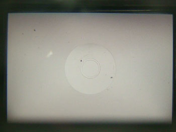 モルトの破片がこびり付いた焦点板